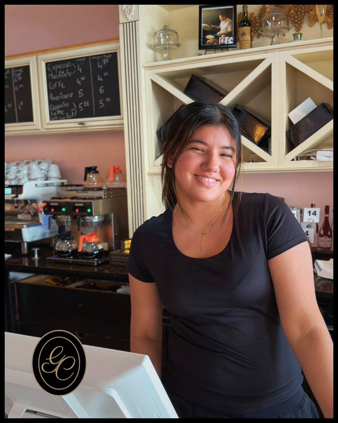 Barista serving a customer at Grain de Café